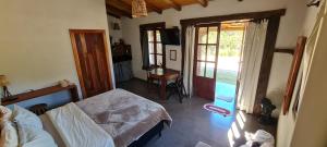 Vale das Pedras Suítes客房内的一张或多张床位
