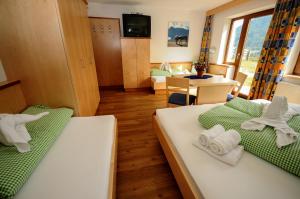 Posteľ alebo postele v izbe v ubytovaní Ferienhaus Gundolf Peter
