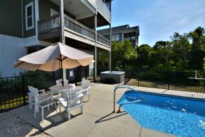 Bazén v ubytování Surfin' Pelican nebo v jeho okolí