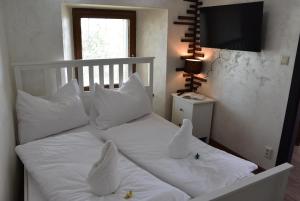 Postel nebo postele na pokoji v ubytování Apartmány Žakovce & SPA