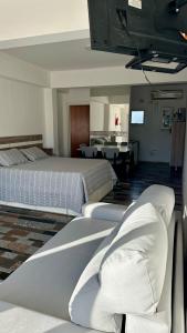 En eller flere senge i et værelse på Complejo Categoría Patagonia