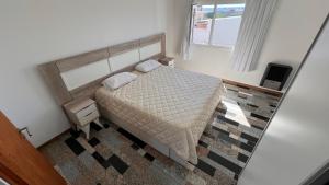 En eller flere senge i et værelse på Complejo Categoría Patagonia