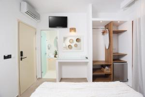 Postel nebo postele na pokoji v ubytování Hotel Magdalena