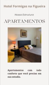 a picture of a hotel room with a bed at Hotel Formigas na Figueira in Tibagi