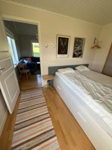 Ένα ή περισσότερα κρεβάτια σε δωμάτιο στο House 100m from lake västra silen