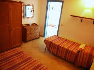 Postel nebo postele na pokoji v ubytování ECO Affittacamere Casa Maica Eco guesthouse