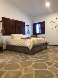 Postel nebo postele na pokoji v ubytování Cuadra Casona el Calvario
