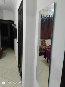 TV a/nebo společenská místnost v ubytování Un joli appartement à Martil pour vos vacances d'été proche de toutes les commodités et à 5 min de la plage ! + 6 fotografií