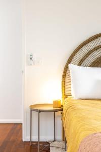Postel nebo postele na pokoji v ubytování Moffat Beach Retreat, Pet-friendly & Ocean Views