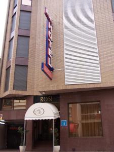 a building with a sign for a restaurant at Hotel Rosi in Benicarló