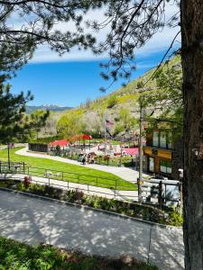 a view of a park with a building at Sport Court! Hot Tub! Putting Green! Bunk Room! in Lava Hot Springs