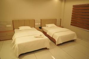 Photo de la galerie de l'établissement Neom Inn, à Meenangadi