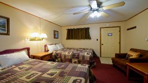 En eller flere senge i et værelse på Arrowhead 11 Deluxe