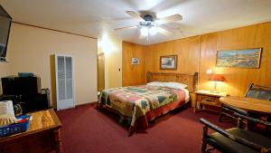 En eller flere senge i et værelse på Arrowhead 11 Deluxe