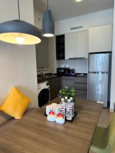 a table with bottles of water on it in a kitchen at Genting Windmill Homestay in Genting Highlands