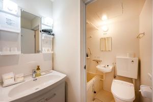 Koupelna v ubytování 里沼リゾート　Hotel KOMORINU + 19 fotografií