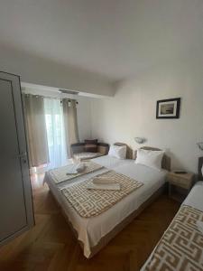 Krevet ili kreveti u jedinici u okviru objekta Villa Three Flags Bed & Breakfast