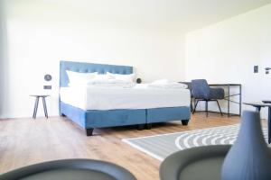 Ένα ή περισσότερα κρεβάτια σε δωμάτιο στο Johouse Zingst Johouse Zimmer 18 +4 φωτογραφίες