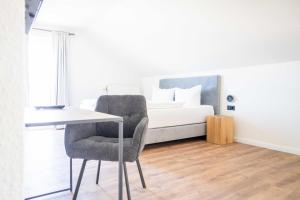 Ένα ή περισσότερα κρεβάτια σε δωμάτιο στο Johouse Zingst Johouse Zimmer 14