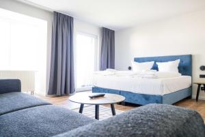 Ένα ή περισσότερα κρεβάτια σε δωμάτιο στο Johouse Zingst Johouse Zimmer 21 +2 φωτογραφίες