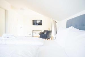 Ένα ή περισσότερα κρεβάτια σε δωμάτιο στο Johouse Zingst Johouse Zimmer 15 +2 φωτογραφίες