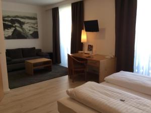 Posteľ alebo postele v izbe v ubytovaní Ferienhotel Alber