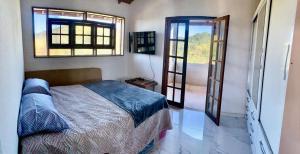 Katil atau katil-katil dalam bilik di Recanto dos Tucanos