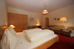 Posteľ alebo postele v izbe v ubytovaní Ferienhotel Alber