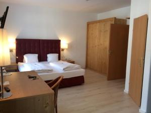 Posteľ alebo postele v izbe v ubytovaní Ferienhotel Alber