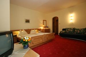 Posteľ alebo postele v izbe v ubytovaní Ferienhotel Alber