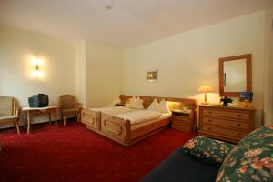 Posteľ alebo postele v izbe v ubytovaní Ferienhotel Alber