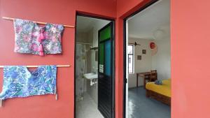 Postel nebo postele na pokoji v ubytování Casa Huipil