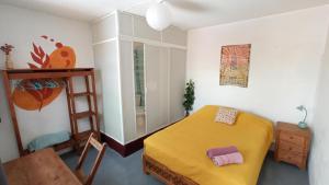 Postel nebo postele na pokoji v ubytování Casa Huipil