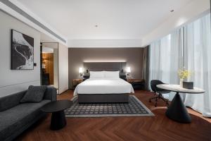 Voodi või voodid majutusasutuse IntercityHotel Shenzhen Bay -Free laundry & Free MiniBar toas