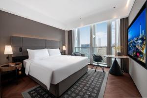 Voodi või voodid majutusasutuse IntercityHotel Shenzhen Bay -Free laundry & Free MiniBar toas