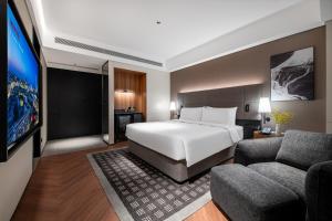 Voodi või voodid majutusasutuse IntercityHotel Shenzhen Bay -Free laundry & Free MiniBar toas