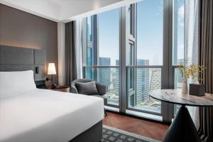 Voodi või voodid majutusasutuse IntercityHotel Shenzhen Bay -Free laundry & Free MiniBar toas