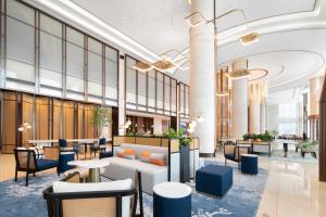 a rendering of the lobby of a planned hotel at Hilton Garden Inn Handan She County in Handan