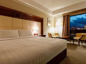 Postel nebo postele na pokoji v ubytování Premier Hotel -Tsubaki- Sapporo