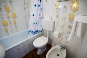 Ванная комната в Sole Surf E Relax - Happy Rentals