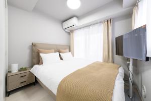 TV a/nebo společenská místnost v ubytování Provence Hotel