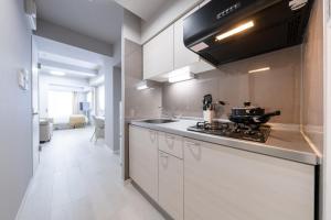 Kuchyň nebo kuchyňský kout v ubytování Provence Hotel