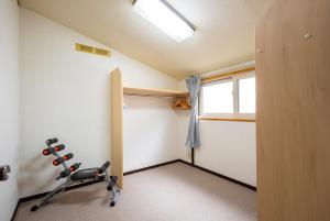 Fitness centrum a/nebo fitness zařízení v ubytování Taro's House Midori