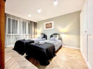 Posteľ alebo postele v izbe v ubytovaní Great Stay In Sopot