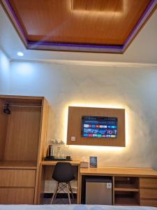 TV a/nebo společenská místnost v ubytování Java Rote Homestay + 3 fotografie