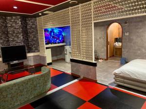 TV a/nebo společenská místnost v ubytování HOTEL Z23