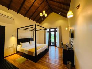 Letto o letti in una camera di Lion Gate Hotel Sigiriya