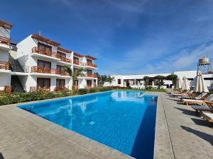 Bazén v ubytování Hotel La Colina nebo v jeho okolí