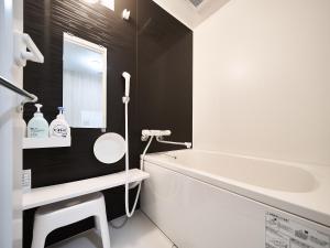 Koupelna v ubytování Okasan Hotel + 37 fotografií