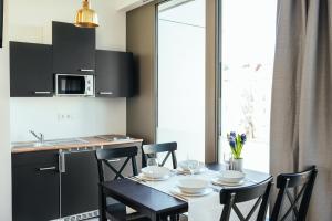 Η κουζίνα ή μικρή κουζίνα στο The Rix Studios & Suites